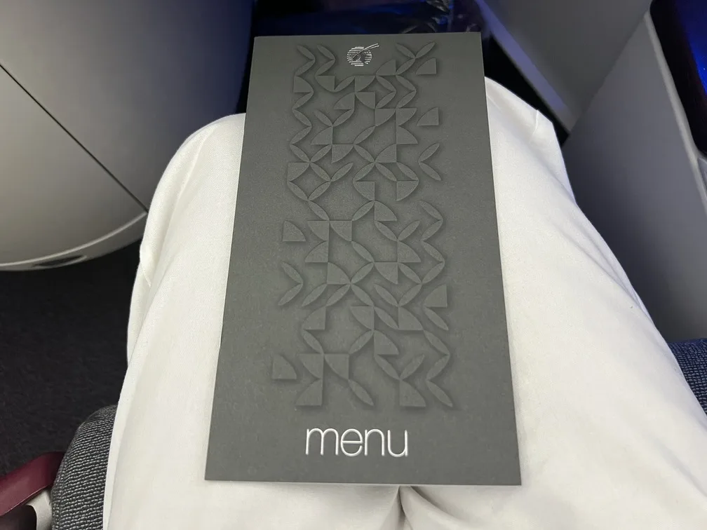 Voando de Executiva Qatar menu