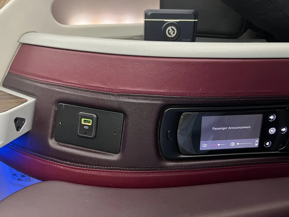 Voando de Executiva Qatar poltrona 10